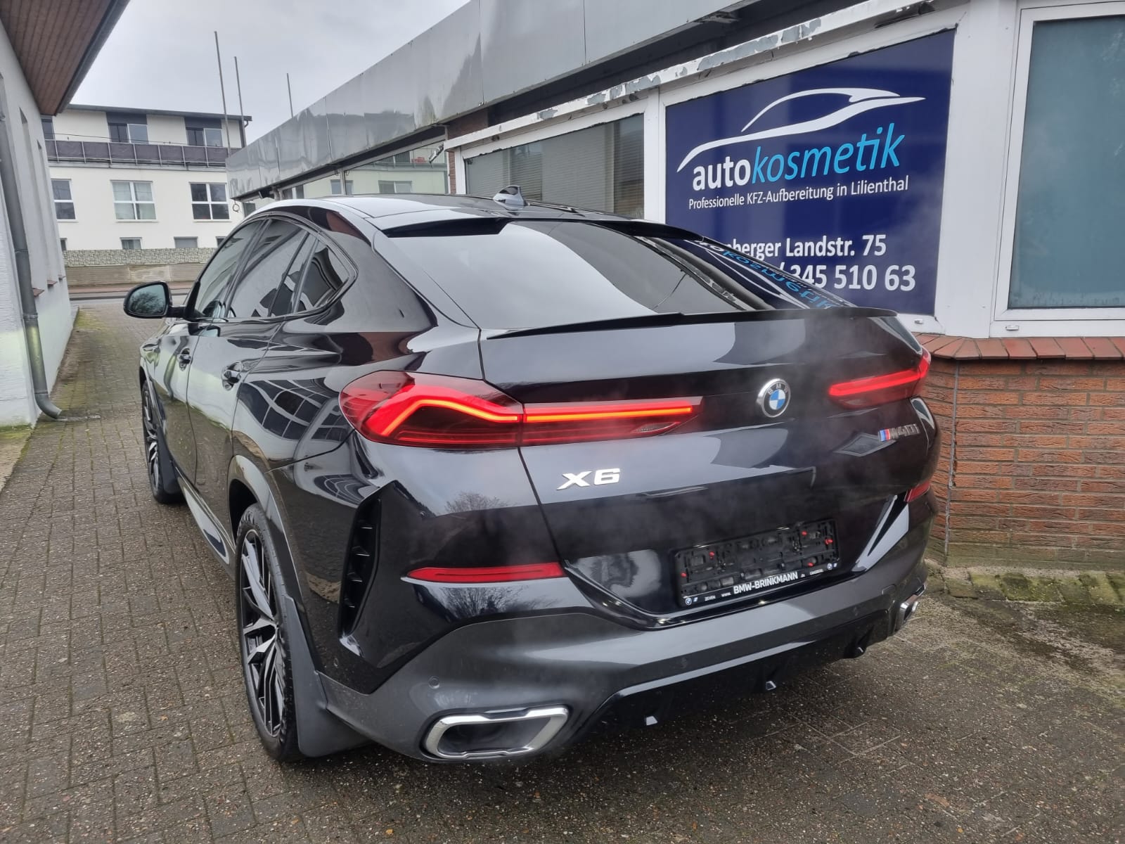 BMW X6 schwarz – Heckansicht nach Politur und Versiegelung