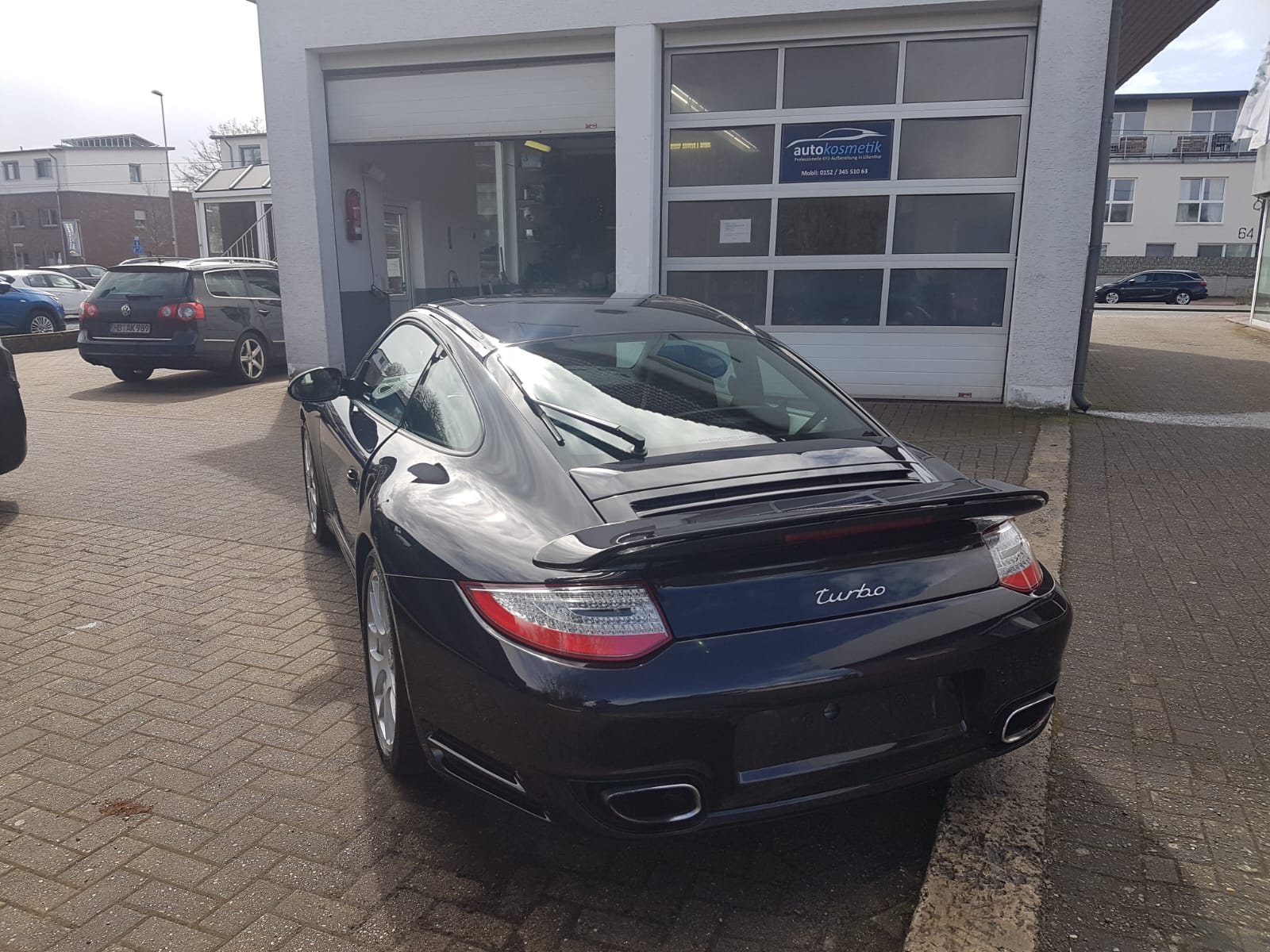 Porsche 911 (997) Turbo schwarz – Heckansicht nach Aufbereitung
